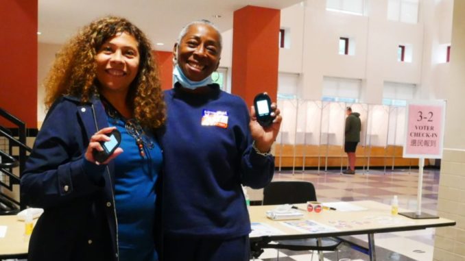Elena with poll worker_cropped